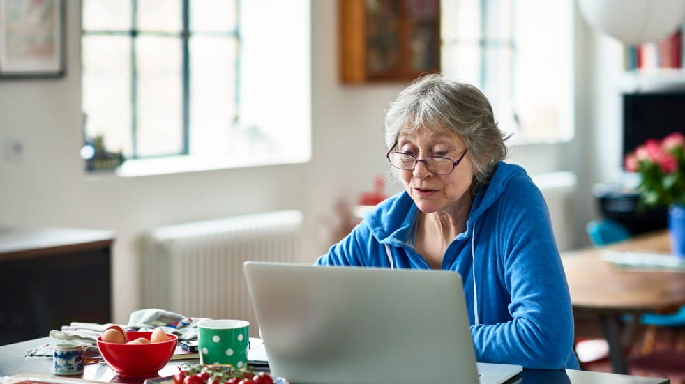 retired woman on laptop